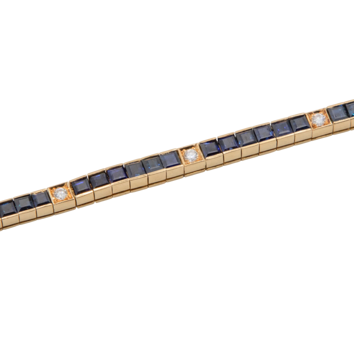 Omega Bracelet or et Pavé de saphirs