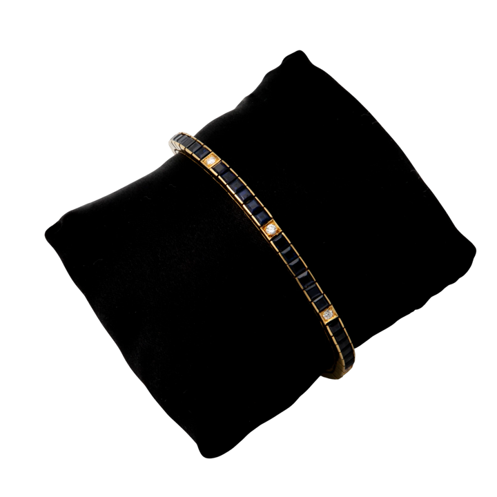Omega Bracelet or et Pavé de saphirs