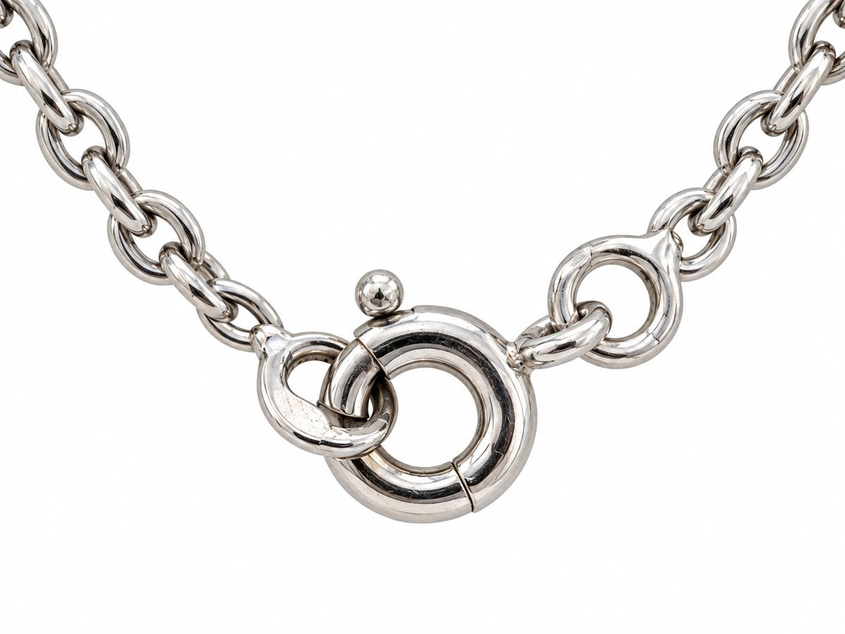 Chaîne en or blanc et pendentif coeur