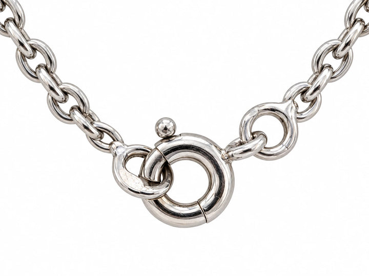 Chaîne en or blanc et pendentif coeur
