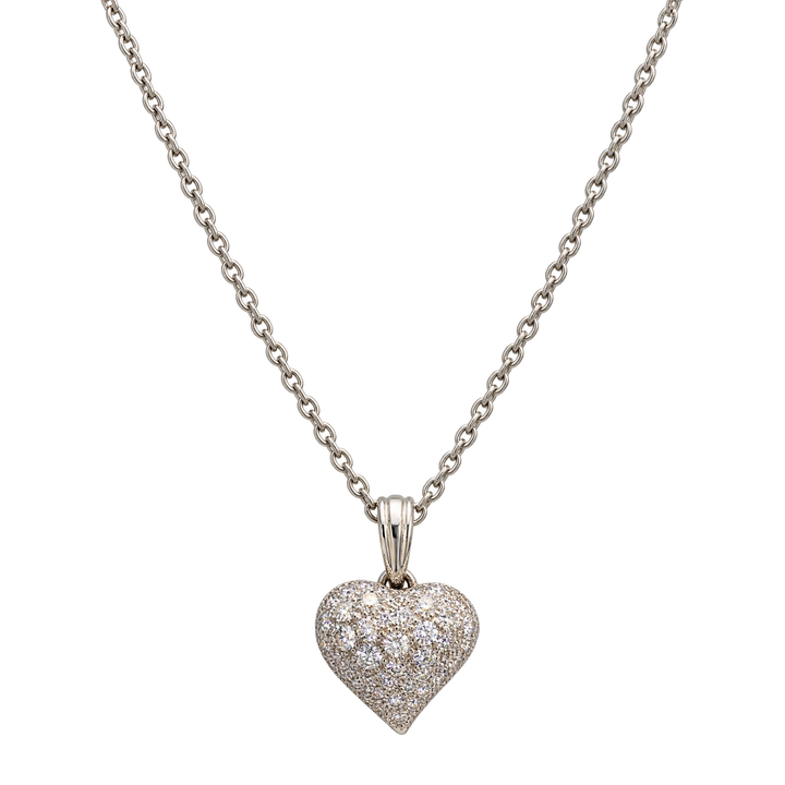 Chaîne en or blanc et pendentif coeur