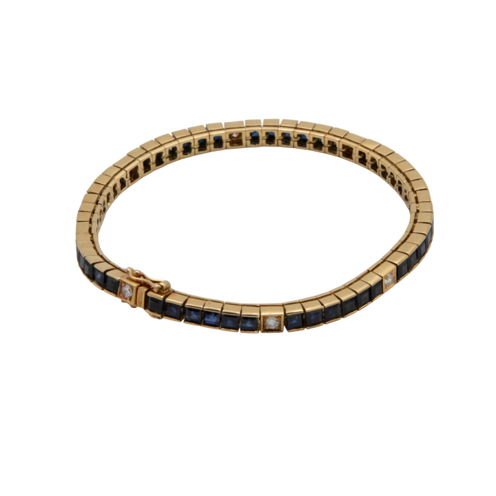 Omega Bracelet or et Pavé de saphirs